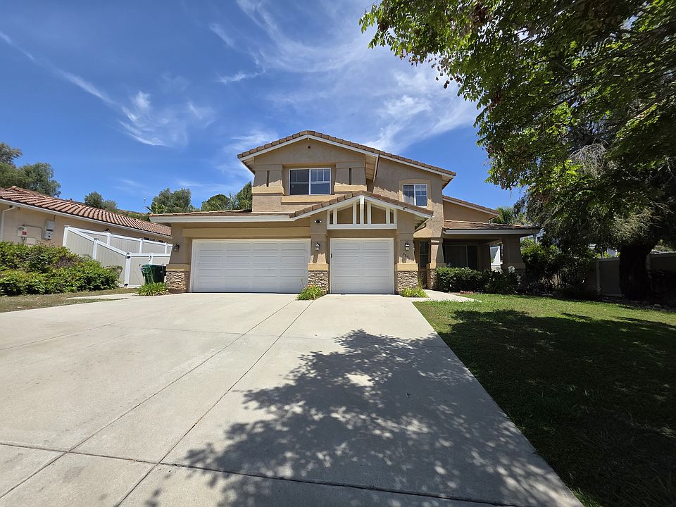Front of House with Driveway