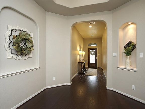 A view of the same space looking towards the entry of the home.