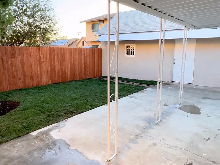 Privately fenced back yard.