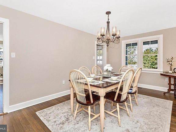 Two entry ways to the main living room from dining