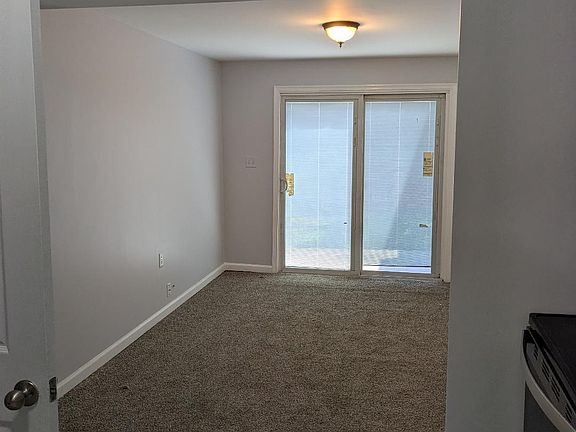 Living room with sliding doors to deck