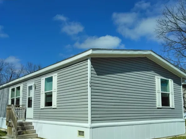 166 Thornapple Cir, Leonard, MI 48367