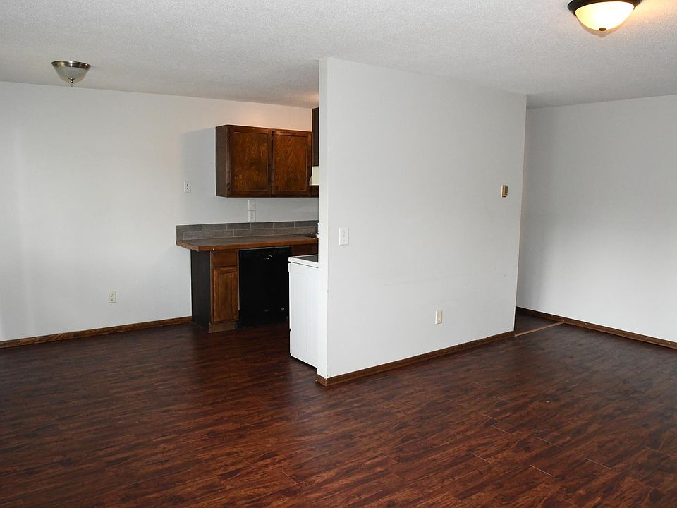 Dining area looking from living room to dining area and kitchen.