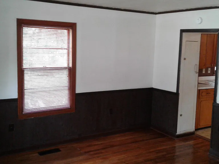 Living room, entry into kitchen