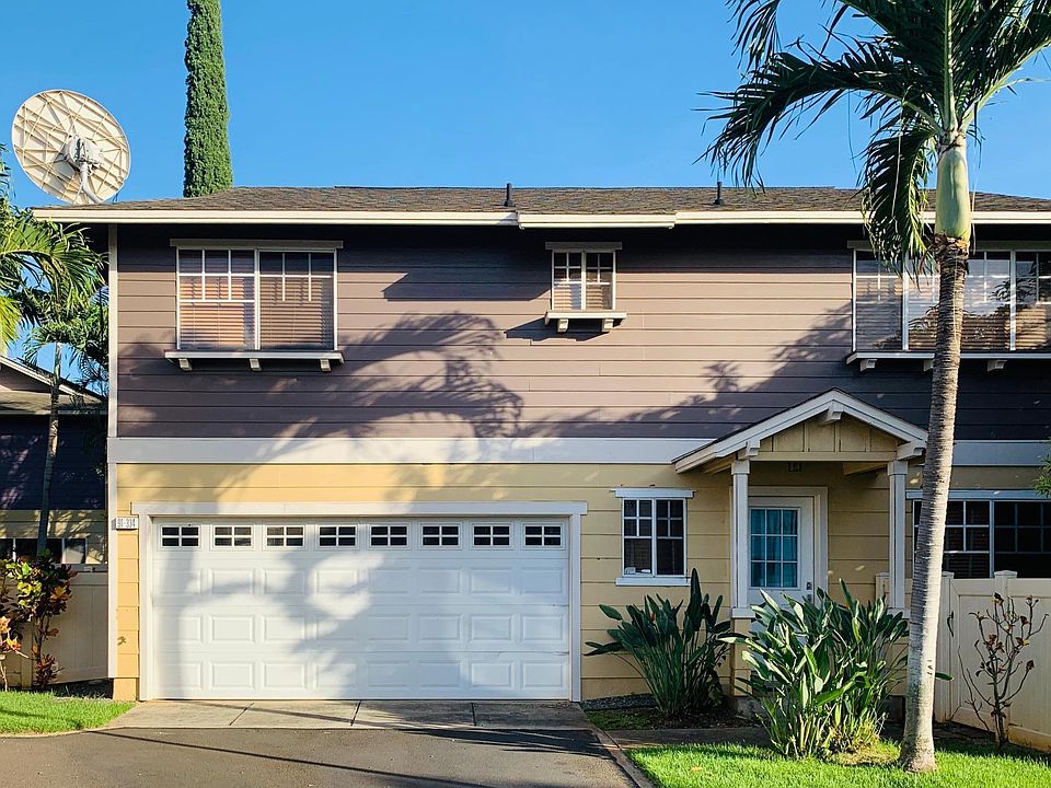 Large Garage and nice yard with fruit trees
