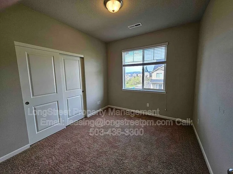 16992 NW Tristan St — Photo 35