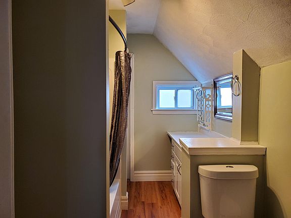 Freshly painted bathroom, vinyl plank flooring