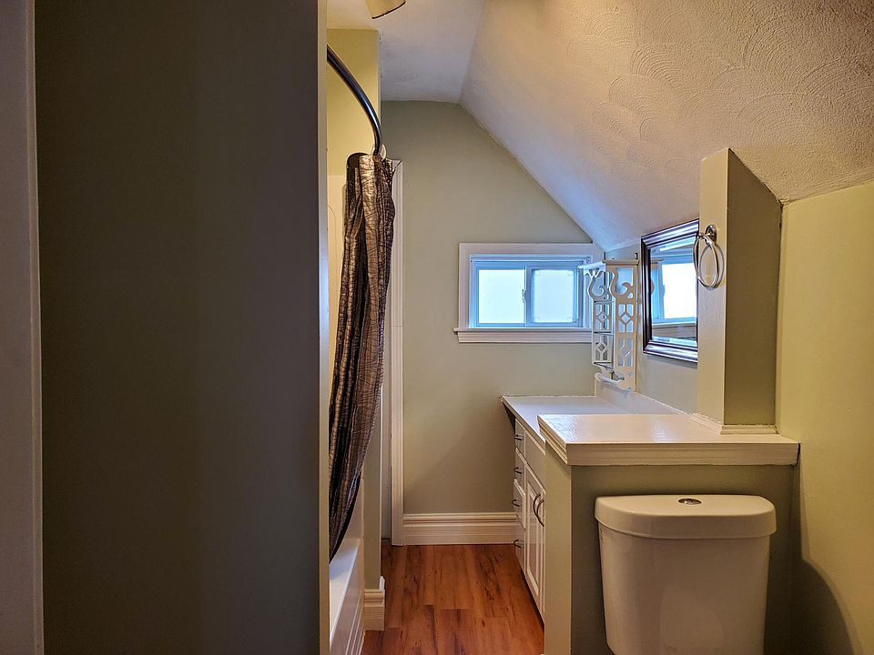 Freshly painted bathroom, vinyl plank flooring