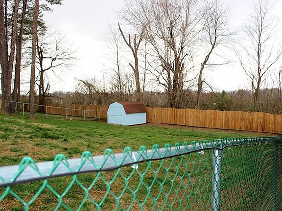 Seller has fenced-in the family-friendly backyard.