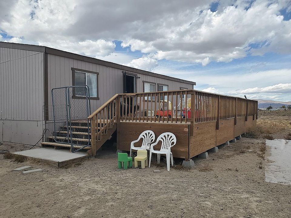 Front of house w/large deck