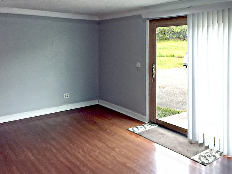 Large walk-out basement with sitting area, 2 large bonus rooms, hallway mudroom area leading to garage and full bath/laundry room hookups.