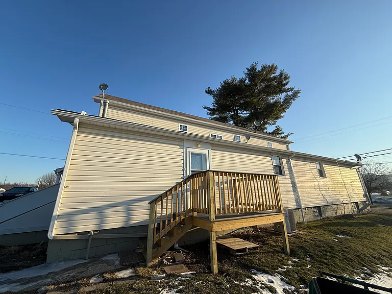 Private entrance with porch and TREX deck!