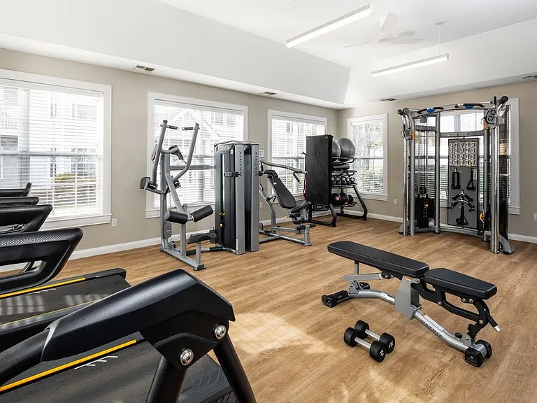 eaves Wilmington West fitness center with strength equipment