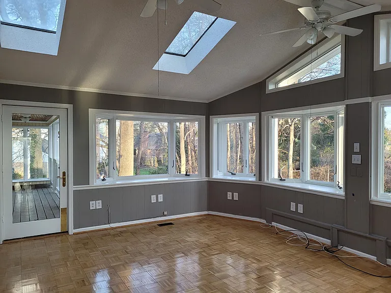 Smaller Sunroom #2 (with balcony) adjacent to family room