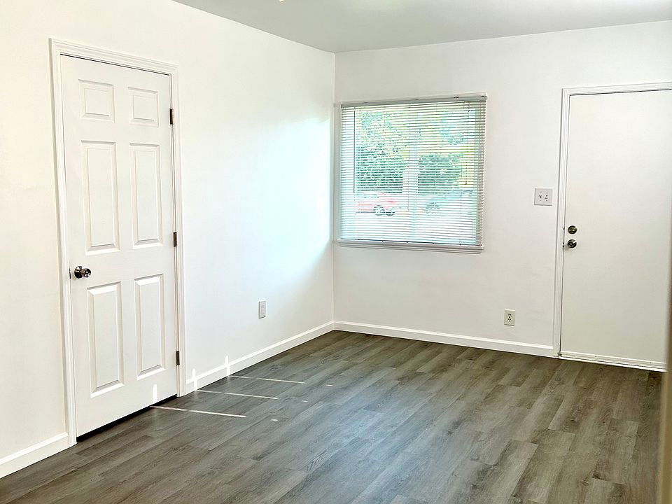 Light, bright unit with new floors, updated plumbing and electrical, tons of storage, oversized closets, bedroom that fits up to a king sized bed, and ONLY ONE SHARED WALL - practically like having your own home!
