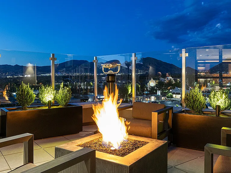 8th floor rooftop deck overlooking downtown and mountains