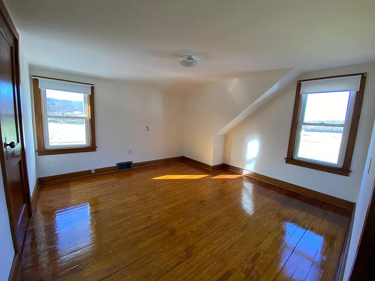 Main bedroom. Restored Hardwood floors, includes large closet.