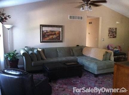Family Room
						:
						Cathedral Ceiling, new laminate wood flooring