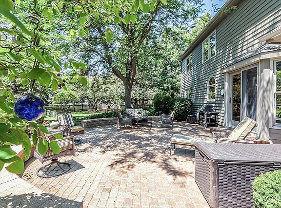 Brick paver patio better than new and recently upgraded. Multiple seating areas.