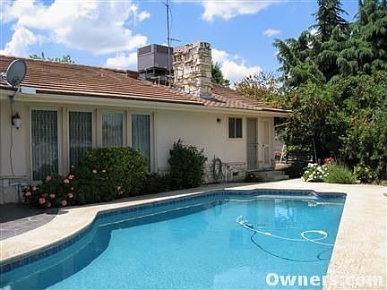 West side in back, with apricot tree.