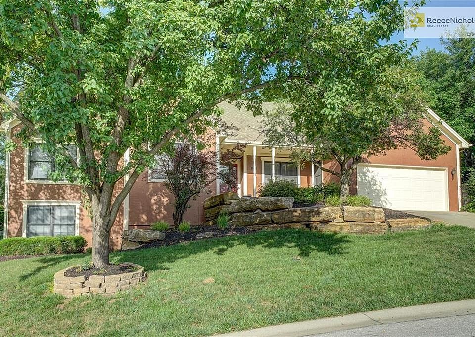 Impressive Reverse 1.5 story in popular subdivision!