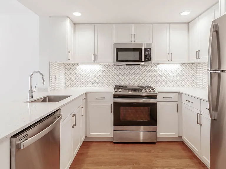 Kitchen with Quartz Countertops and Stainless Steel Appliances