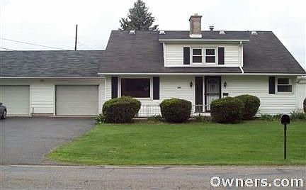 33 Ft. By 25 Ft. Attached Garage & Basement