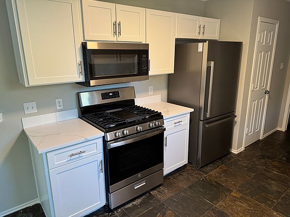 Completely renovated kitchen with brand new cabinets and stainless steel appliances.