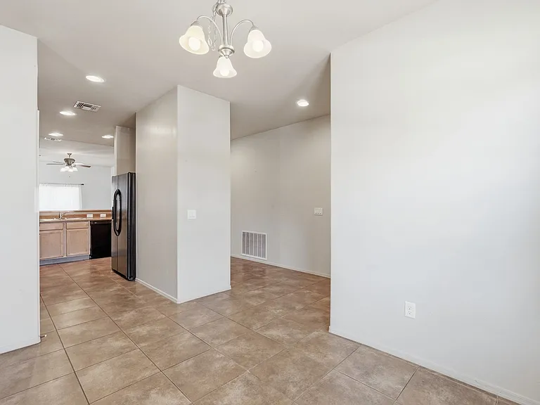 Dining room leading into kitchen