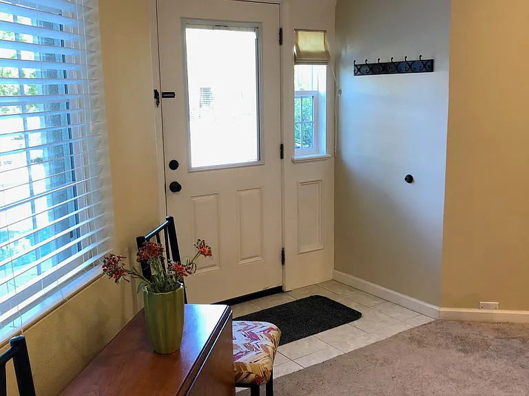 Entry from front door. New carpet and entry laminate added (not shown)