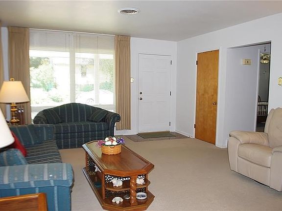 Living room with view to entry.