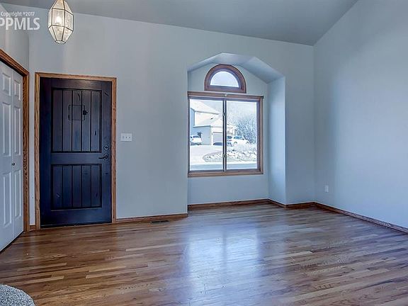 Front entry~hardwood flooring throughout the main level.