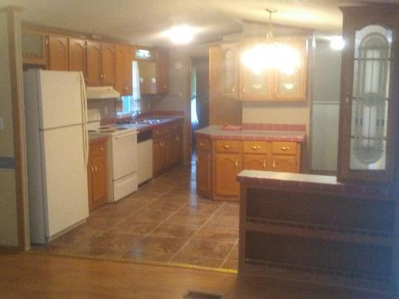 Large oak kitchen etched glass cabinetry 