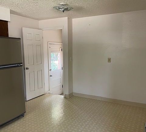 Kitchen door that goes to the yard and the basement