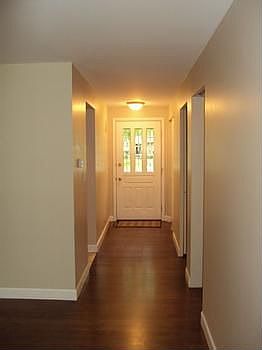 New wood flooring in the living room and foyer.