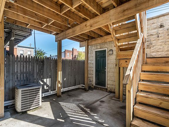 Back Patio w/ access to decks and detached garage