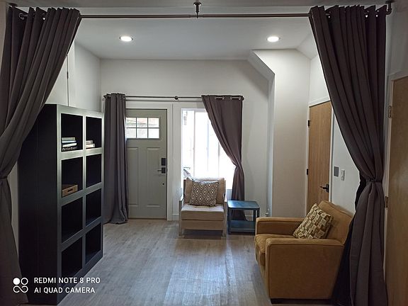 Private or open work / sleep space area with black-out partition curtains.