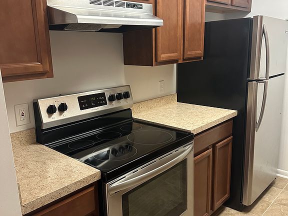 "Functional kitchen design with generous counter space for everyday cooking."