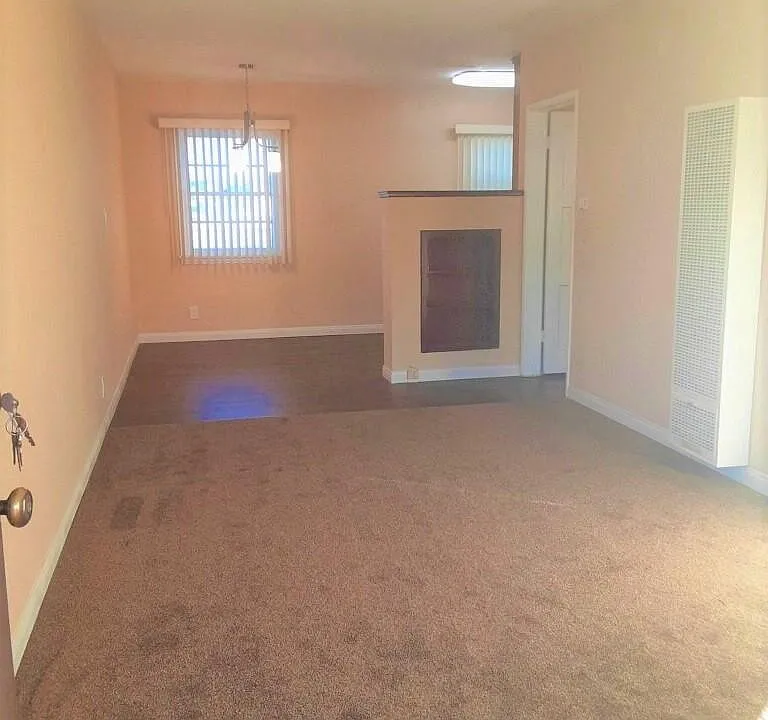 Living room look toward dining area