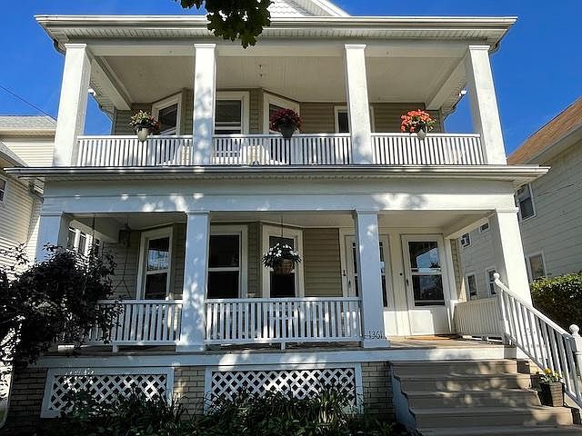 Large front porch, shade in the morning and sun in the afternoon. Short walk to shopping and dining.