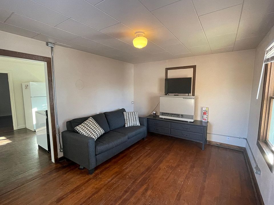 Living room w/ gas heater.