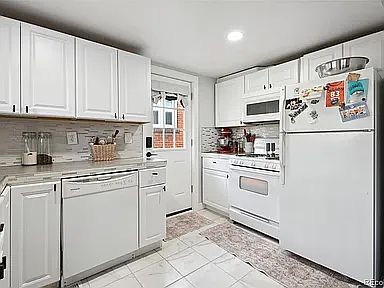 Kitchen with side door.