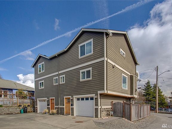 Stylish corner unit situated back away from the street. 