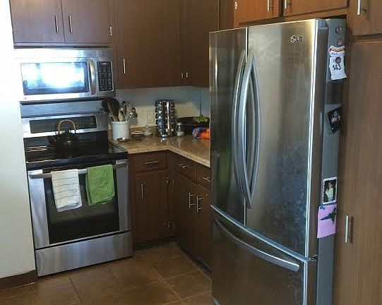 Kitchen stove and fridge