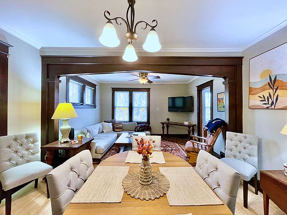 Watch TV from dining room table or add additional seating around table for guests.