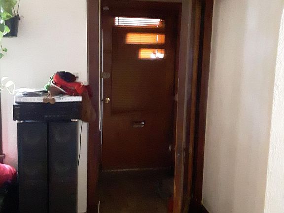 Front entry door and hallway