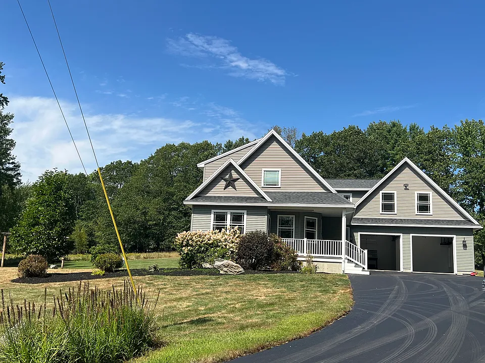 House, apartment is located on second floor, parking will be to the right side of garage.
