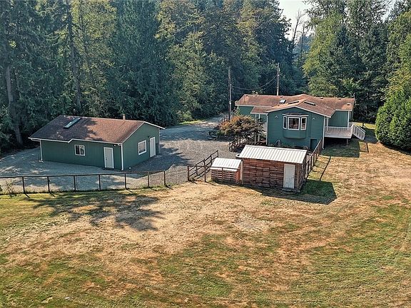 Large, private location with beautiful home and outbuildings