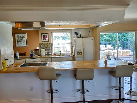 Open airy kitchen counter Island. Great for literally everything. Socializing cocktail hour dinner cooking whatever you can think of.