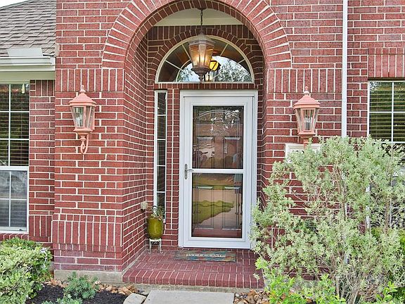 Inviting brick entry welcomes you in!